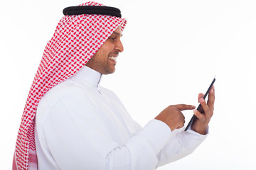 Wall Mural - side view of arabian man using tablet computer