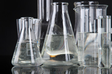 test tubes on black background