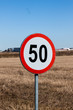 © VertigoBarrov - Speed Limit Sign in Rural Setting