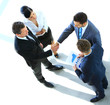© ASDF - Top view of a successful business deal at office