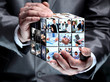 © ASDF - man holding abstract cube with business images
