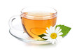 Cup of tea with mint leaves and chamomile flower