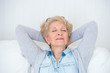 © Milles Studio - Smiling happy senior woman relaxing at home