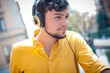 © Eugenio Marongiu - hipster young man listening to music
