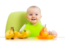 Happy Baby Eating Fruits