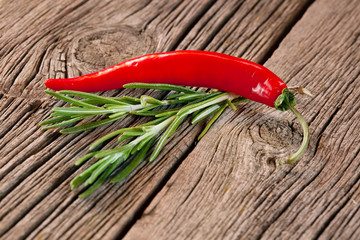 Wall Mural - Hot red chili and rosemary