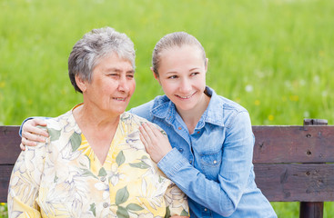 Wall Mural - Elderly woman and her daughter