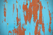 Turquoise Board With Peeling Paint