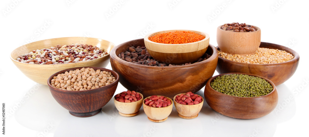 Different kinds of beans in bowls isolated on white