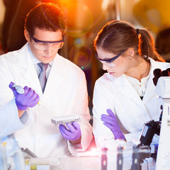 Poster - Health care professionals working in laboratory.