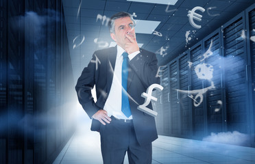 Aufkleber - Businessman standing in data center with currency graphics
