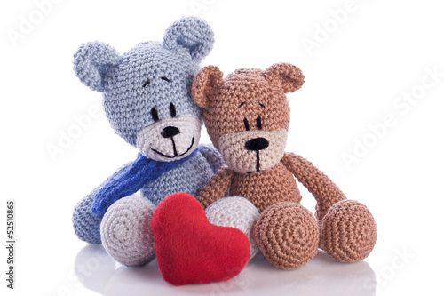 Fototapeta na wymiar two teddy bears with red heart pillow love