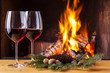 red wine at cozy fireplace