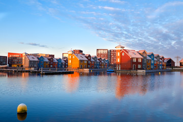 Fototapete - buildings on water at Reitdiephaven, Groningen