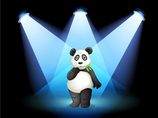 Wall Mural - A panda at the center of the stage with spotlights