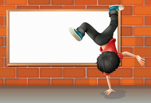 A Boy Breakdancing In Front Of The Empty Board