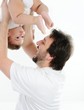 © Jasmin Merdan - Happy young man holding a smiling 4-5 months old baby, isolated