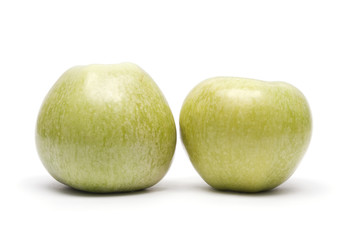 Two green apples isolated on white