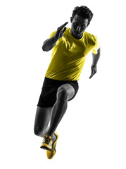 Wall Mural - young man sprinter runner running silhouette