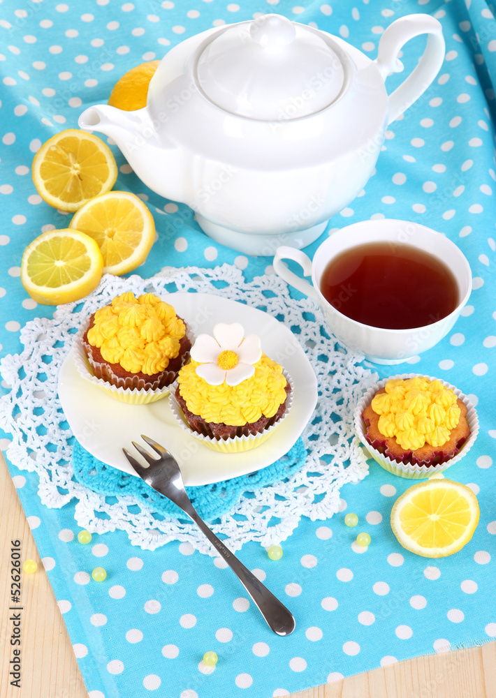 Beautiful lemon cupcakes and flavored tea
