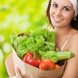© vgstudio - Woman in fitness wear with vegetarian food