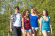 © william87 - Group of Teenage Friends Walking at Park