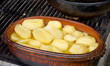 potato in clay vessel