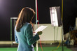 Actress Holding Script Rehearsing in Set