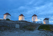 Windmills Of Mykonos Island In Greece By Night