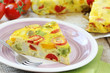 Sliced Spanish tortilla with potatoes and other vegetables