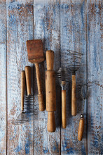 Retro Kitchen Utensils Tools On Old Wooden Table In Rustic Style
