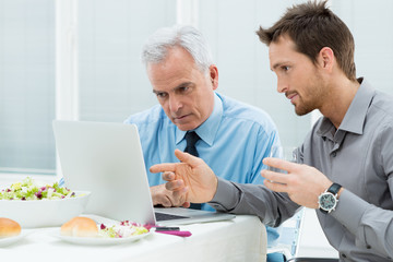 Business People Working at Lunch