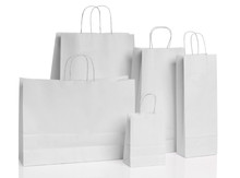 Various White Paper Shopping Bags Isolated