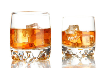 Brandy glasses with ice isolated on white