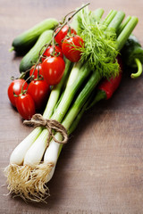 Wall Mural - fresh spring onions and vegetables