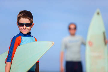 Wall Mural - Father and son with surfboards