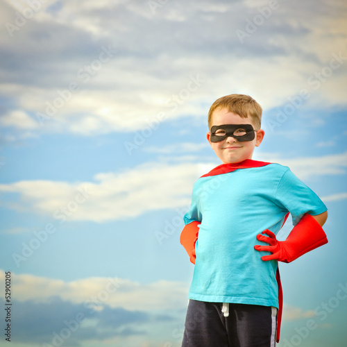 Child pretending to be a superhero with copy space Canvas Print