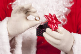 Fototapeta  - Jewelry ring gift Santa Claus