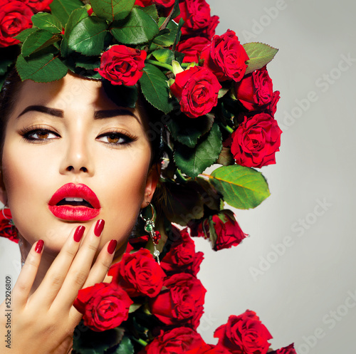 Fototapeta na wymiar Beauty Fashion Model Girl Portrait with Red Roses Hairstyle