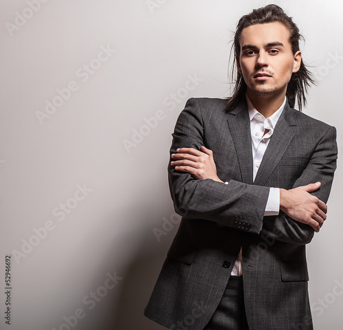 Fototapeta dla dzieci Portrait of handsome long-haired stylish man.