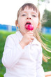 © kolinko_tanya - little girl with lollipop