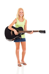 Wall Mural - preteen girl playing a guitar