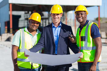 Wall Mural - architect team on construction site