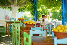 A Dish Of Lemons In Typical Greek Outdoor Cafe