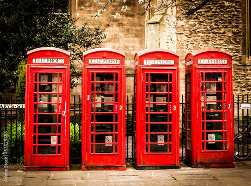 Fototapeta dla dzieci Row od british red telephone boxes