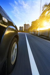 car on the road with motion blur background.