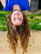 beautiful child hanging upside