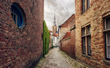 Fototapeta Uliczki - Narrow street in Bruges, Belgium