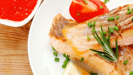 Poster - savory sea fish : baked salmon strips dish with red caviar over 