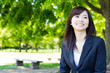 © taka - asian businesswoman in the park